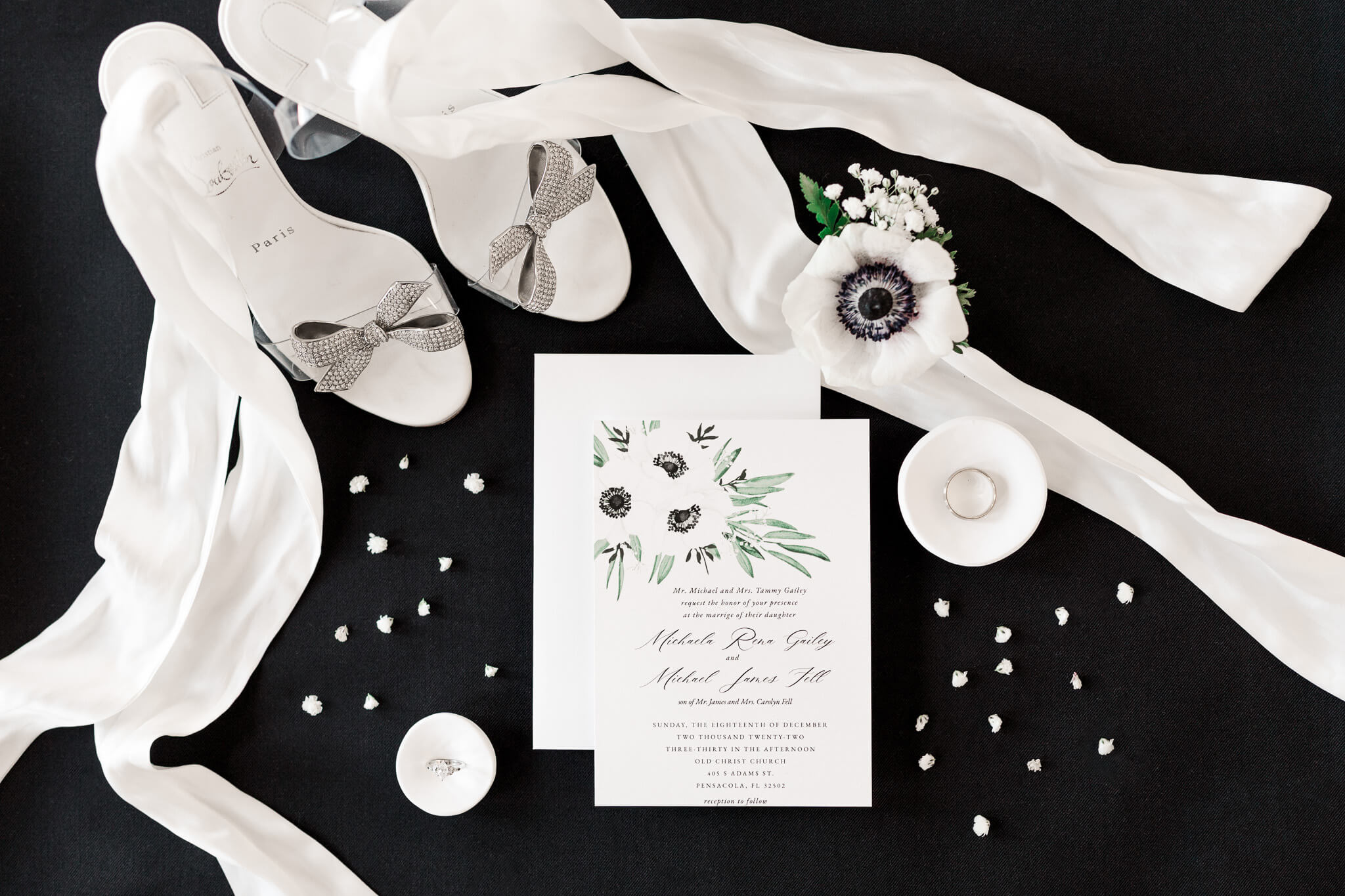 Black and white wedding day details with anemone flowers and Christian Louboutin wedding shoes